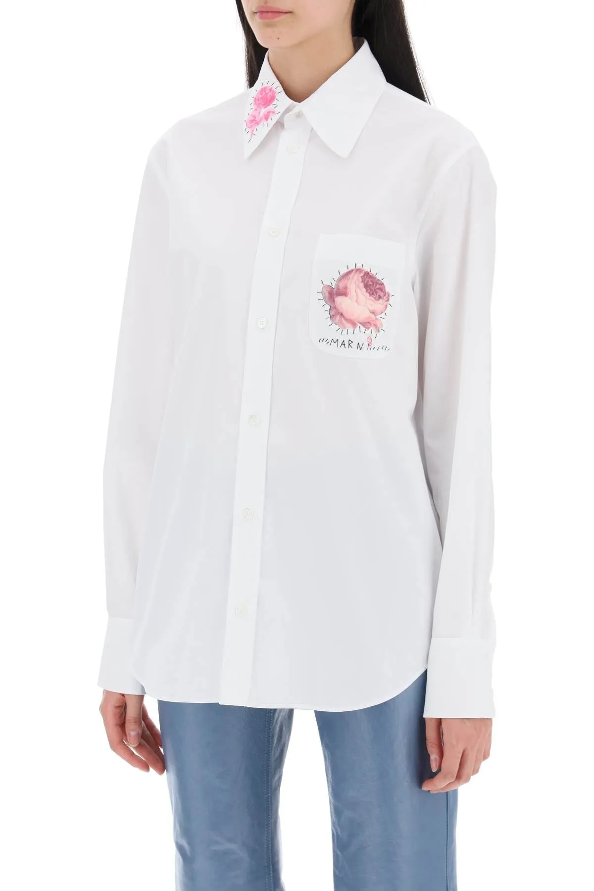 "shirt with flower print patch and embroidered logo