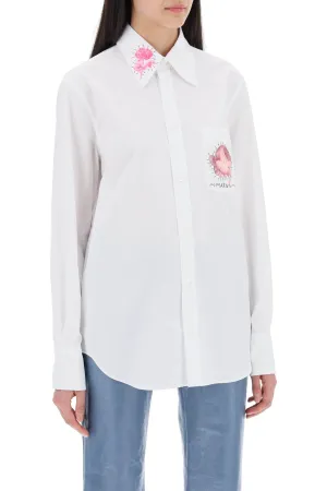 "shirt with flower print patch and embroidered logo